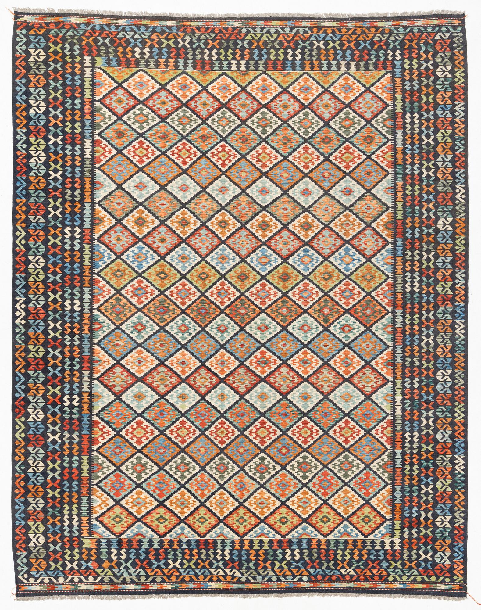 A kilim carpet, circa 396 x 310 cm.