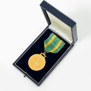 An 18K gold medal, Sporrong, Stockholm 1958.