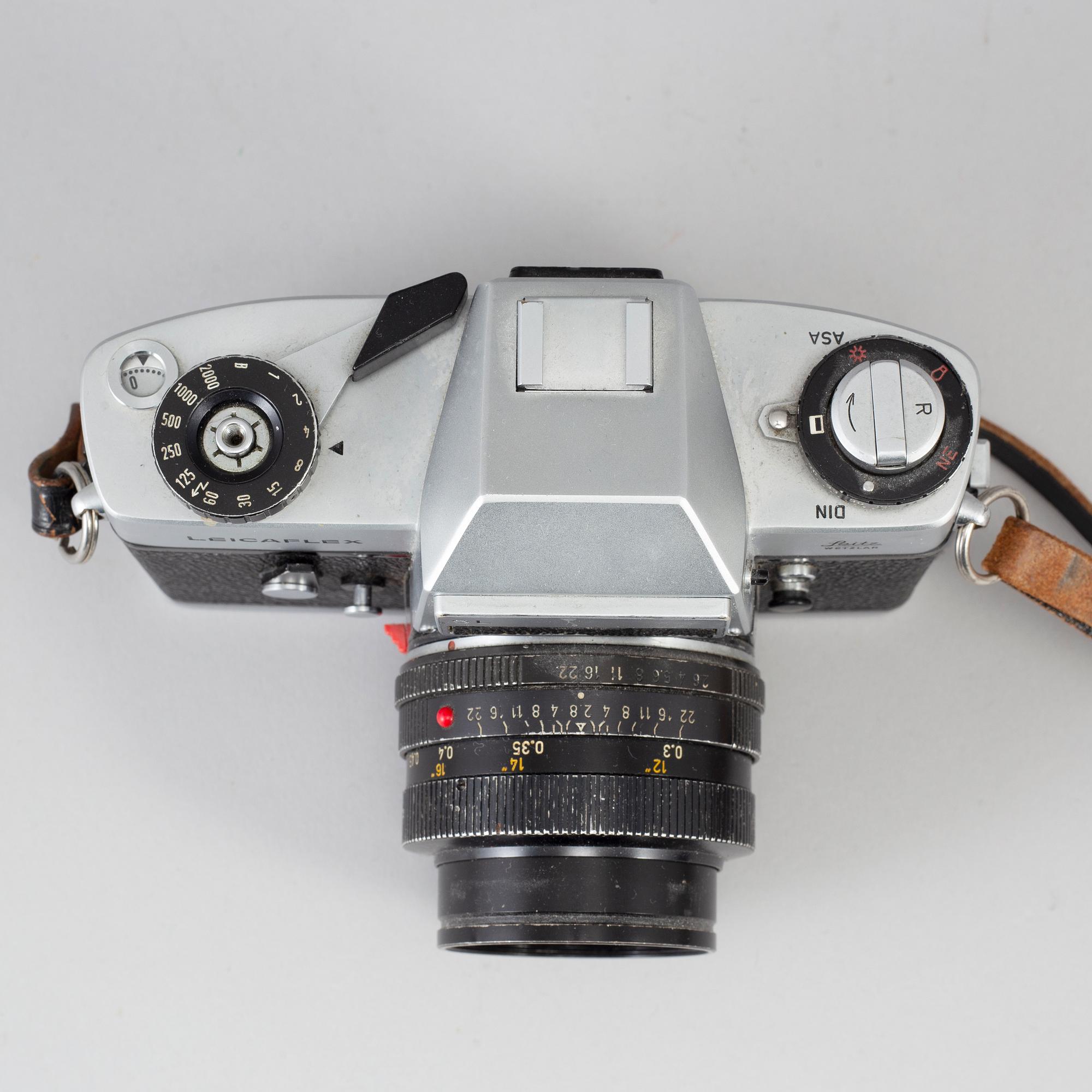LEICAFLEX SL, with 4 lenses.