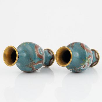 A silk clad box with two cloisonné vases, China early 20th Century.