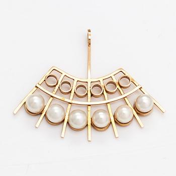 A 14K gold pendant with cultured pearls. Helsinki 1964.