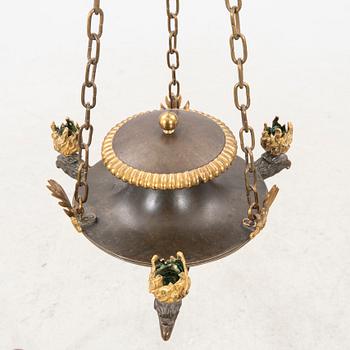 An Empire bronze chandelier.