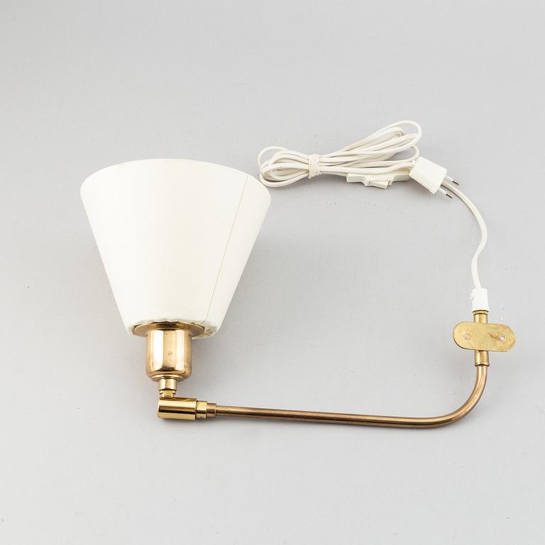 A model 2226 brass wall light by Josef Frank for Firma Svenskt Tenn.