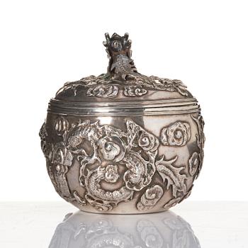 A Chinese Silver Dragon Bowl, mark of Wang Hing & Co, active c 1854-1925.