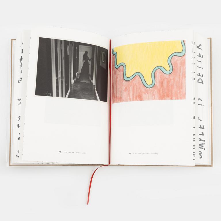 Moncler, book 'Freeze for Frieze' and thermos.