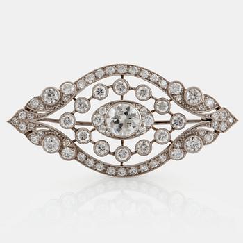 A platinum brooch set with old-cut diamonds with a total weight of ca 2.00 cts.