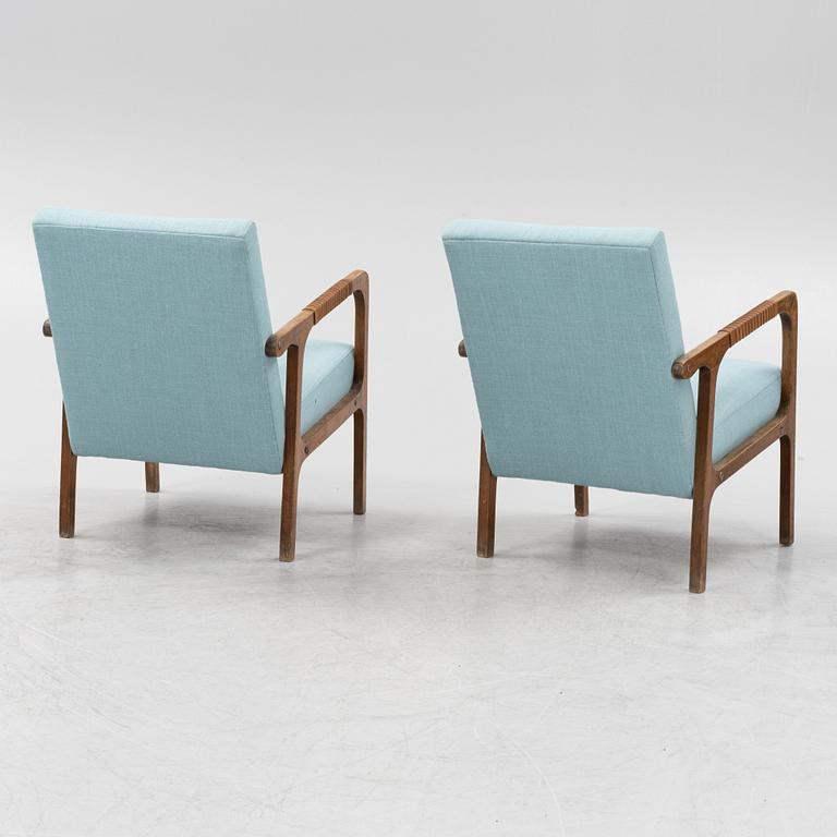 a pair of 1950's armchairs.
