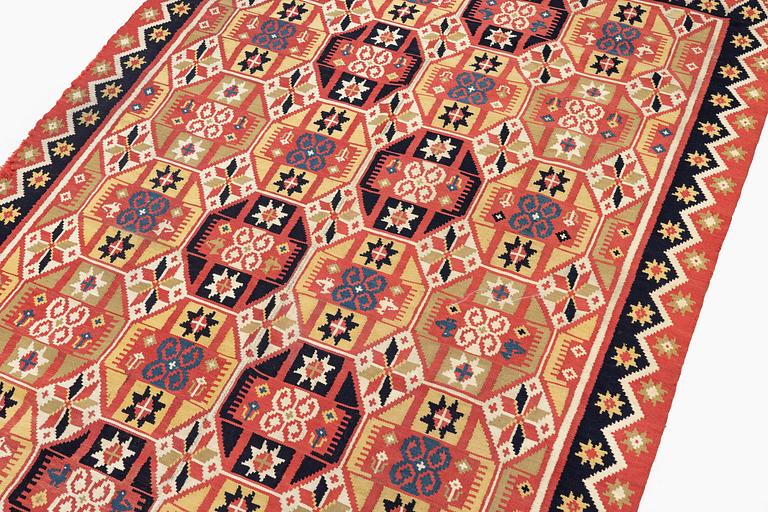 A double-interlocked tapestry bed cover, c. 188 x 116 cm, Scania, Färs, Gärds or Villands district, around 1800-1830.
