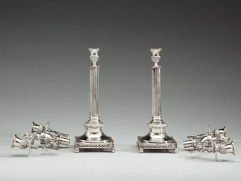 A pair of Swedish 18th century silver candleabra, makers mark of Mattias Engman, Stockholm 1796.