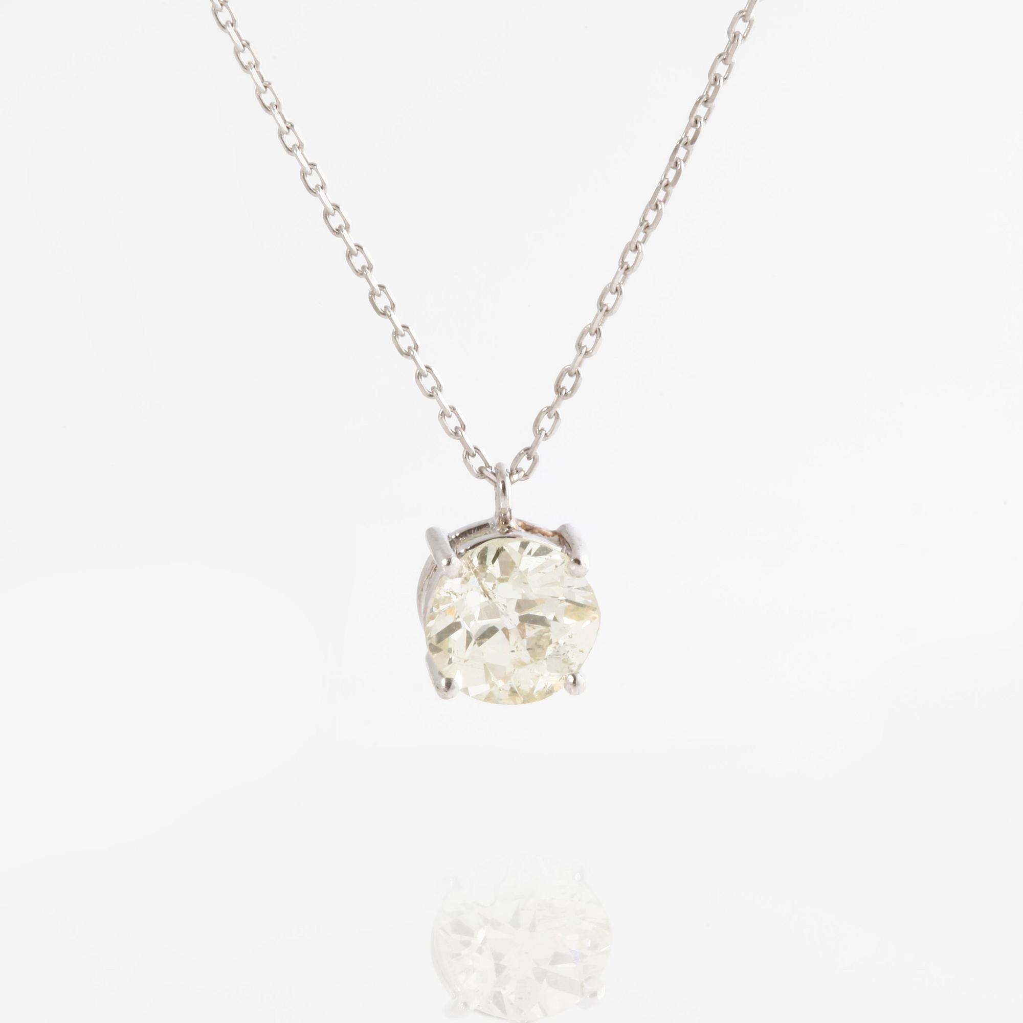 A circa 1.60 cts old-cut diamond pendant.