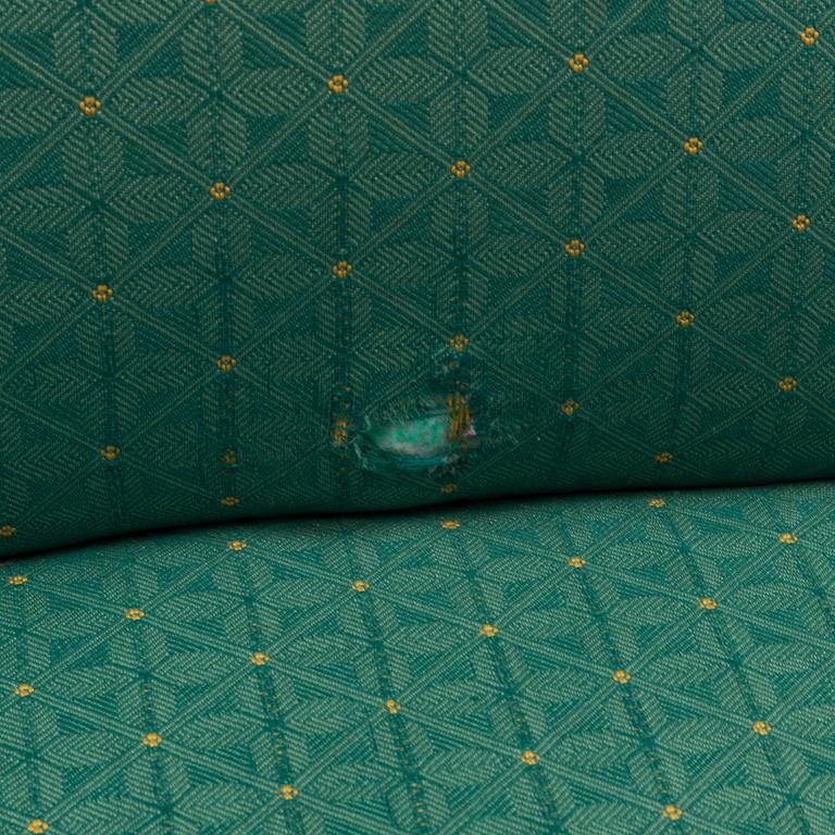 A 1960s Alf Svensson "Contour" armchair and stool.