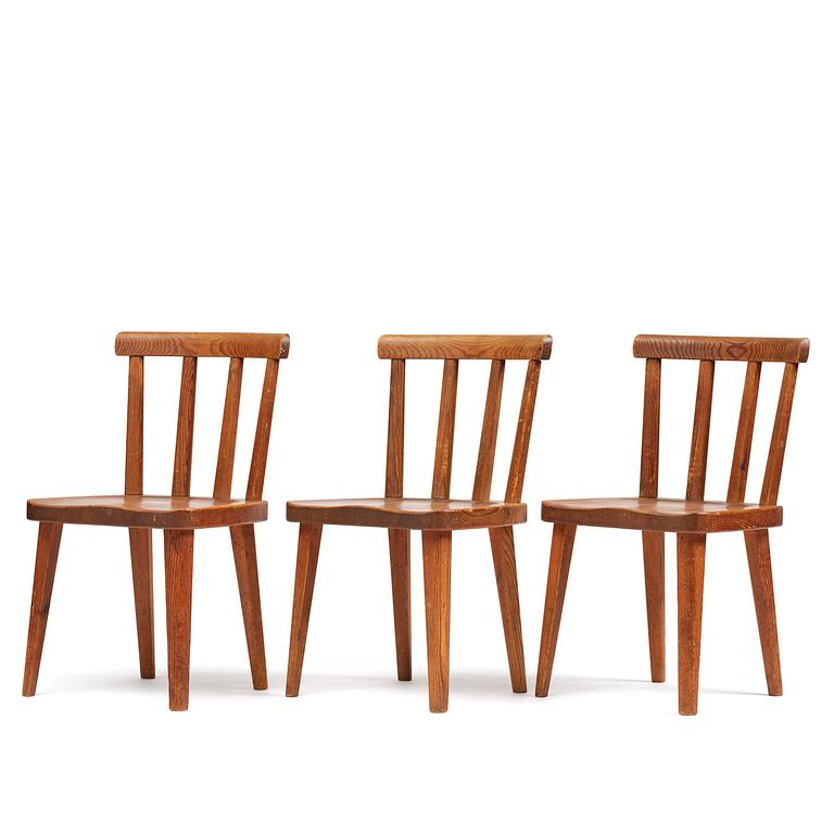 Axel Einar Hjorth, a set of three stained pine "Utö" chairs, Nordiska Kompaniet, Sweden, 1930s.