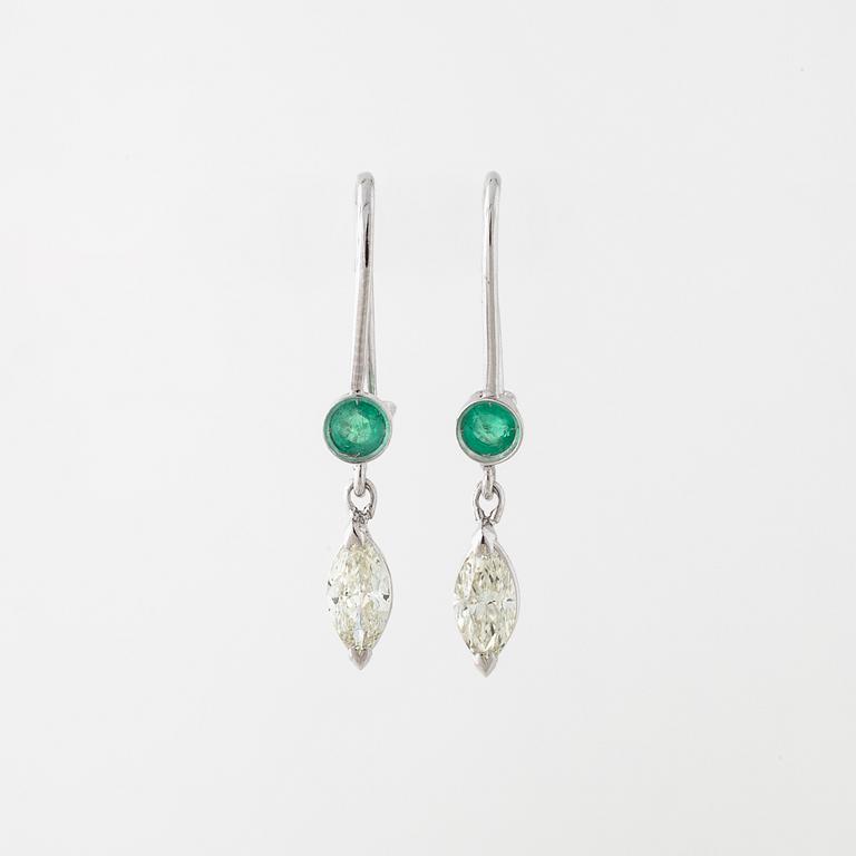 A pair of emerald and marquise cut diamond earrings.