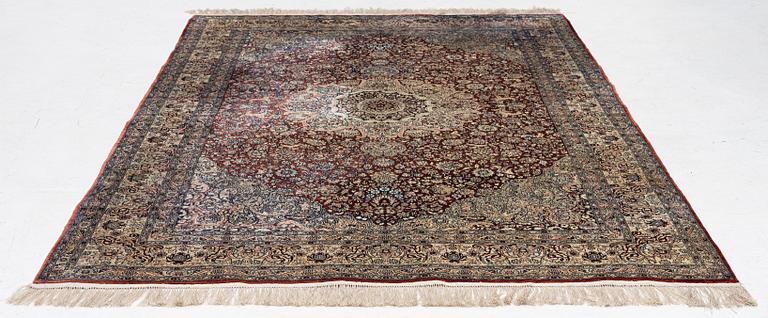 Carpet, part silk, approx. 240 x 158 cm.