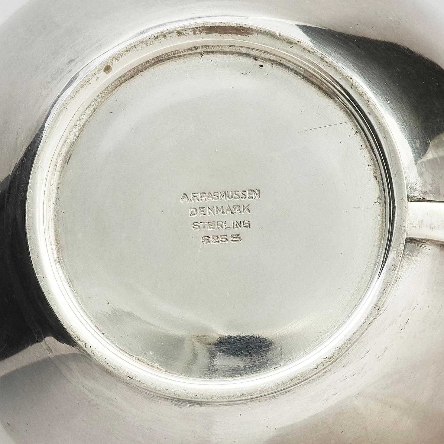 Anton F. Rasmussen, a silver water pitcher with bakelite handle, Aarhus, Denmark, cirka 1950s.