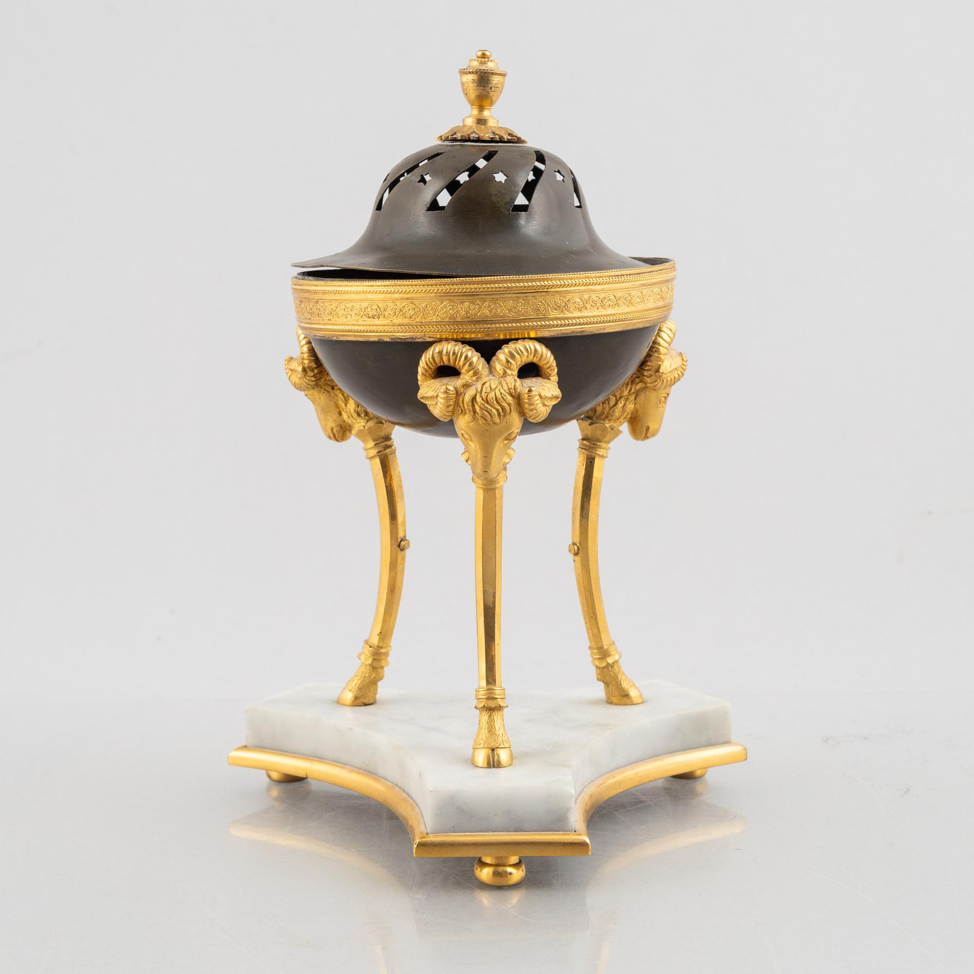 A French Empire ormolu and patinated bronze brûle-parfum, early 19th century.