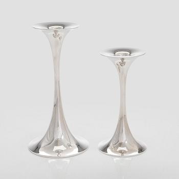 Tapio Wirkkala, A set of four silver candlesticks, "Trumpetti", Kultakeskus, Hämeenlinna 1979 and 1990.