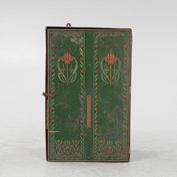 A sheet metal cabinet, 'Thule Cacao', early 20th Century.
