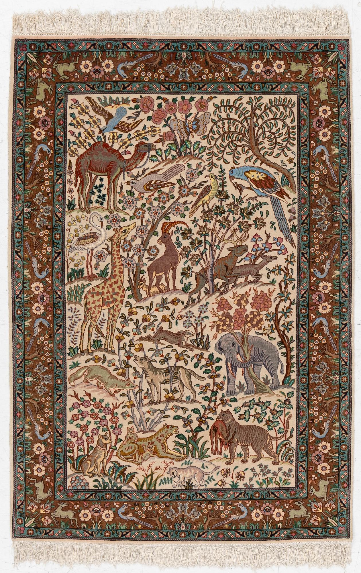 A Tabriz part silk rug, c. 145 x 100 cm.