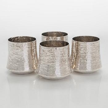 Tapio Wirkkala, four silver beakers, and a rosewood and sterling silver tray, Kultakeskus, Hämeenlinna 1973-74.