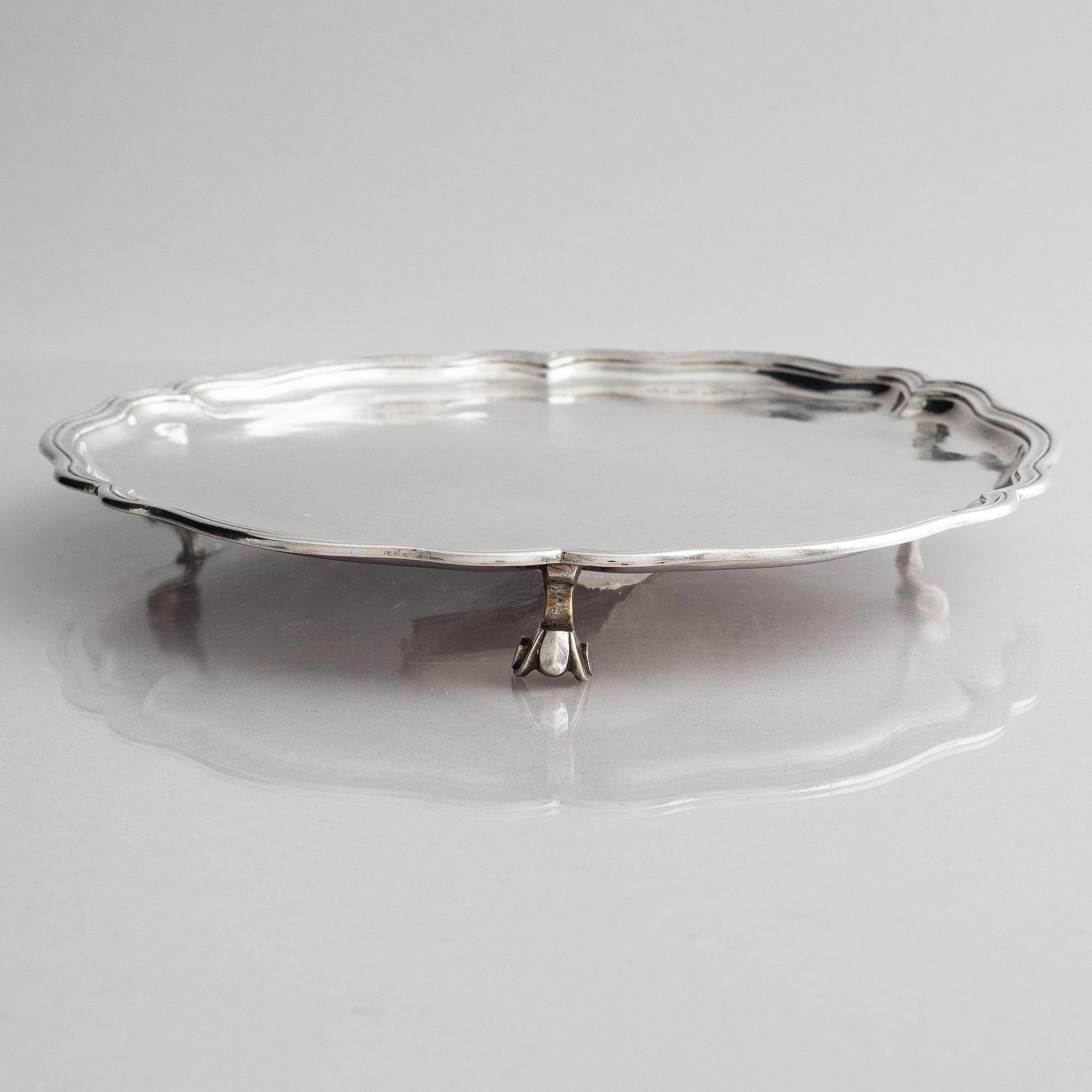 A Russian silver salver/dish, unclear maker's mark, assay master Ivan Frolov, St. Petersburg, 1759.