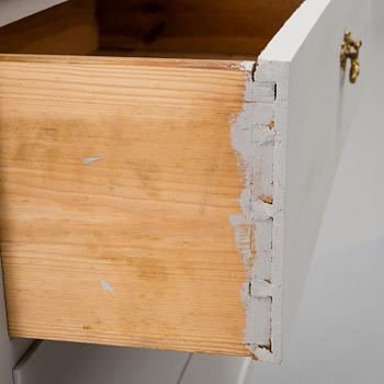 an early 20th century painted chest of drawers.