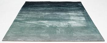 A Designers Guild carpet 'Capisoli teal', ca 205 x 300 cm.