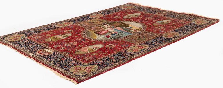 A signed semiantique pictoral Tabriz carpet, c. 269 x 189 cm.