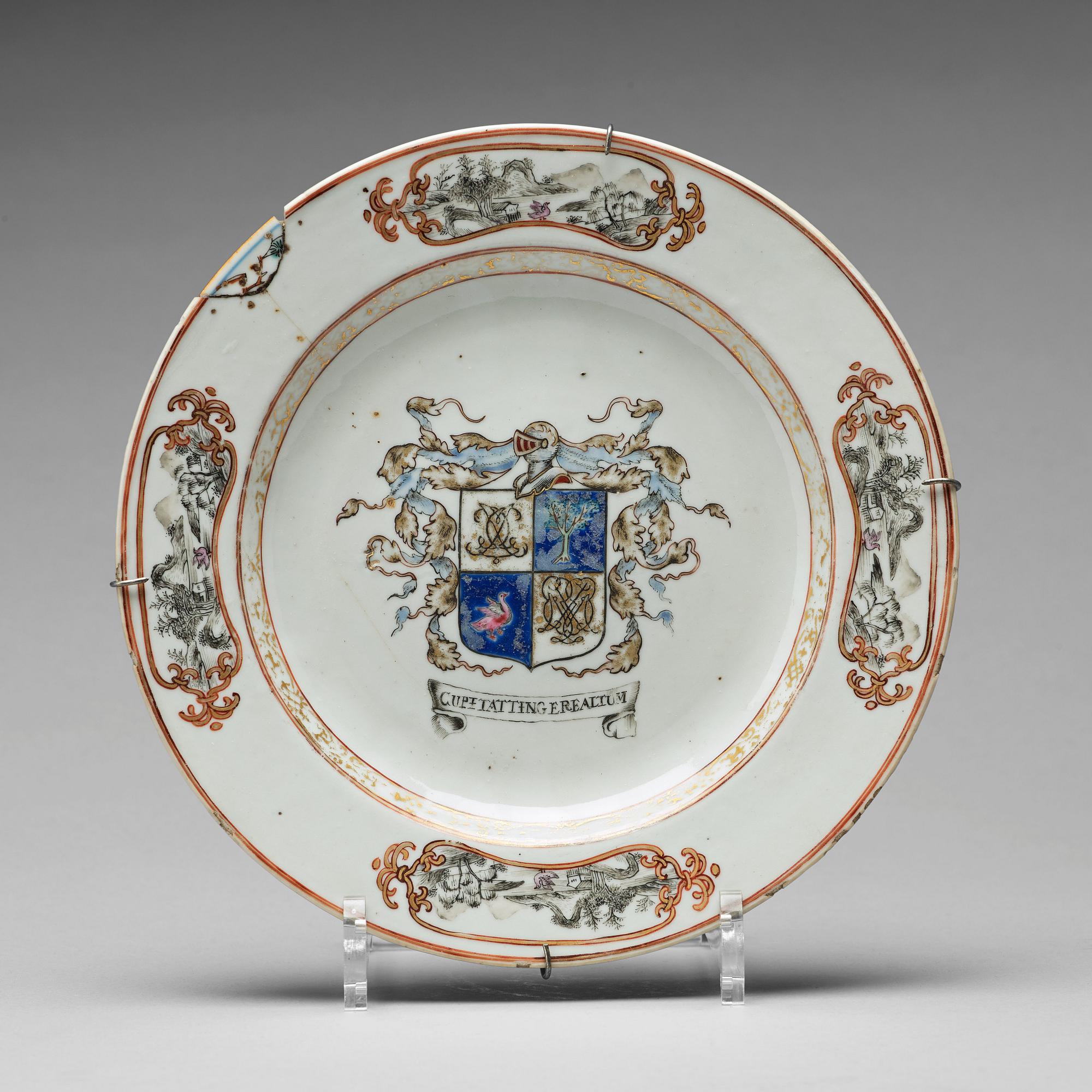 A set of four armorial dinner plates, Qing dynasty, Qianlong (1736-95).