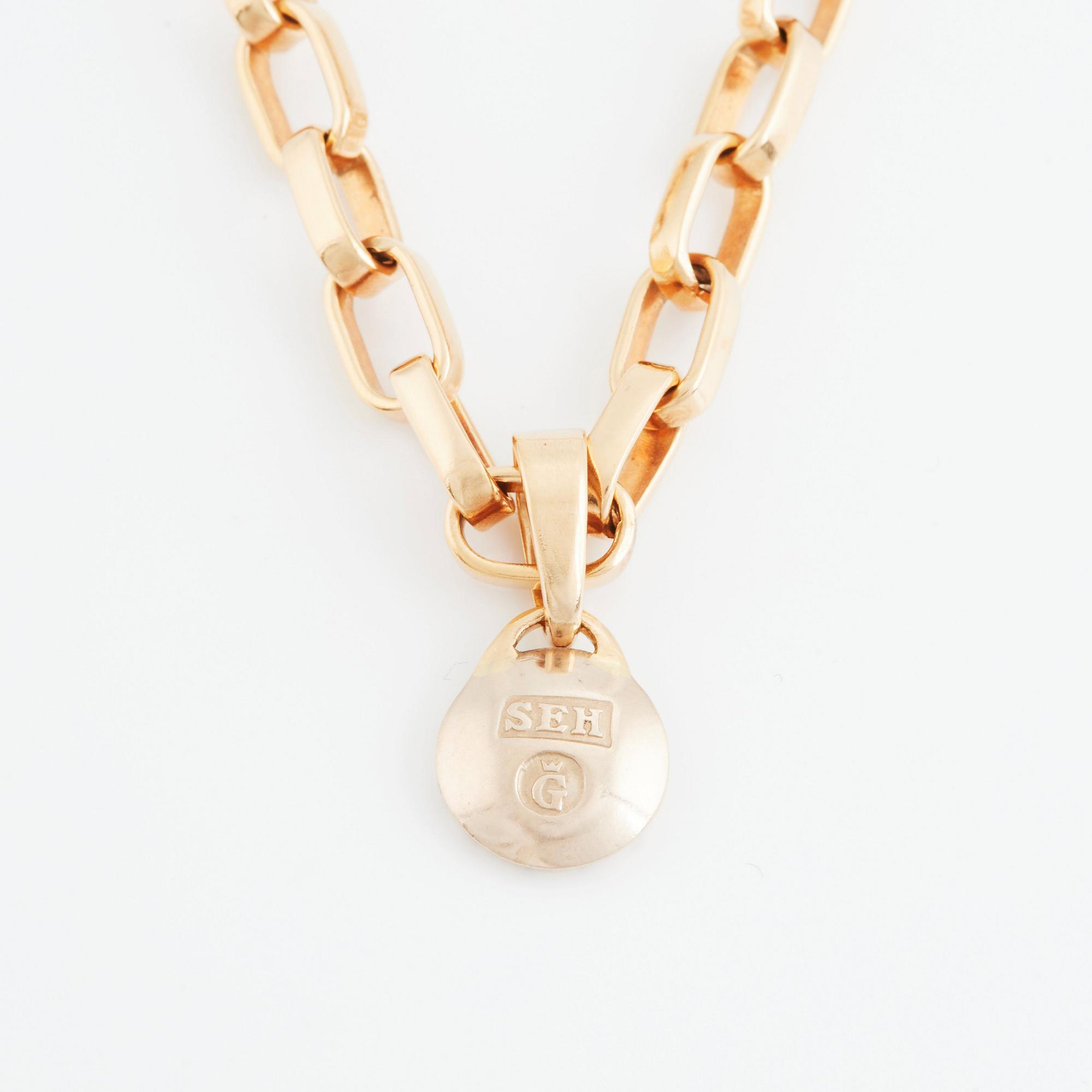 Sven-Erik Högberg, an 18K gold chain with a pendant  Göteborg 1962.