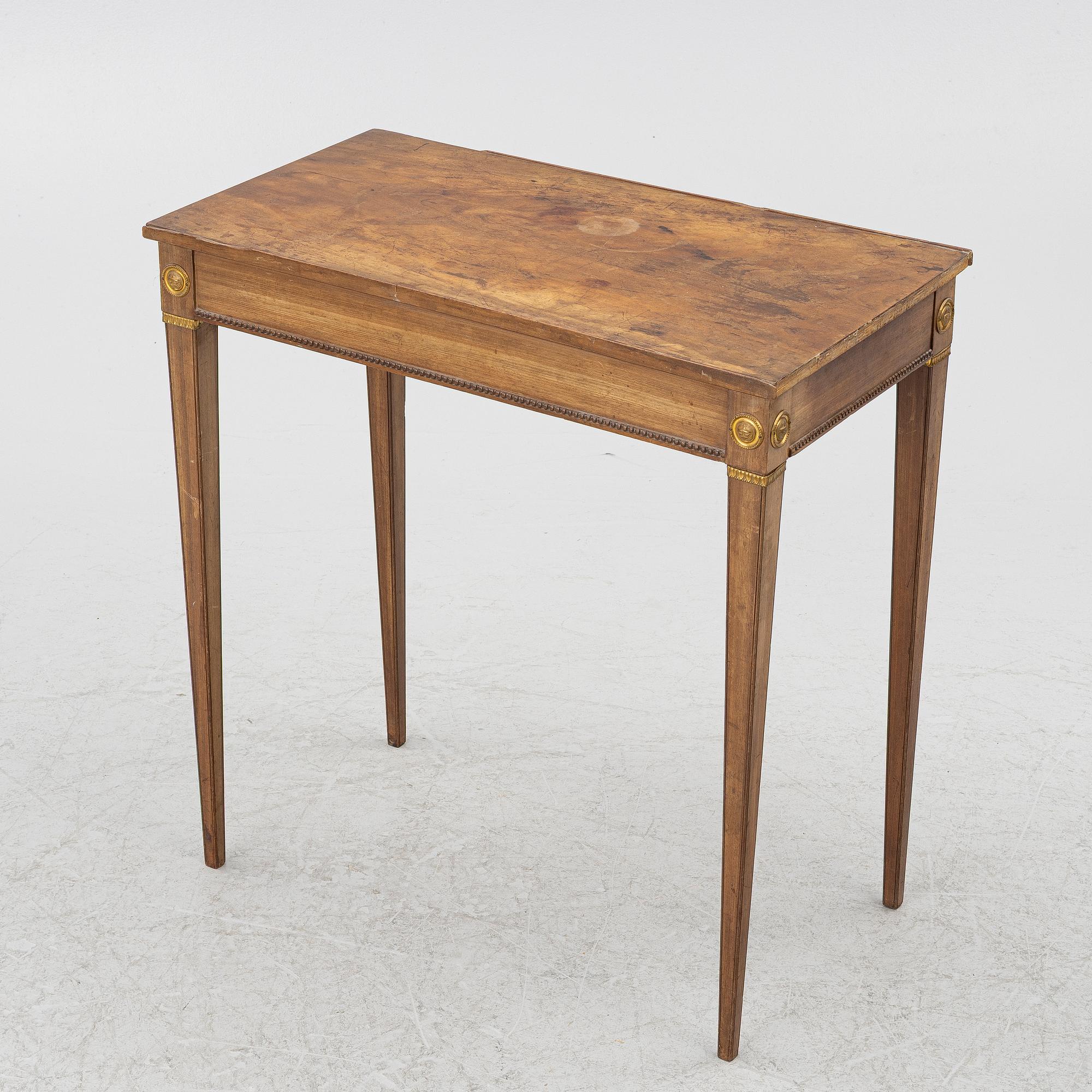 A late Gustavian table, circa 1800.