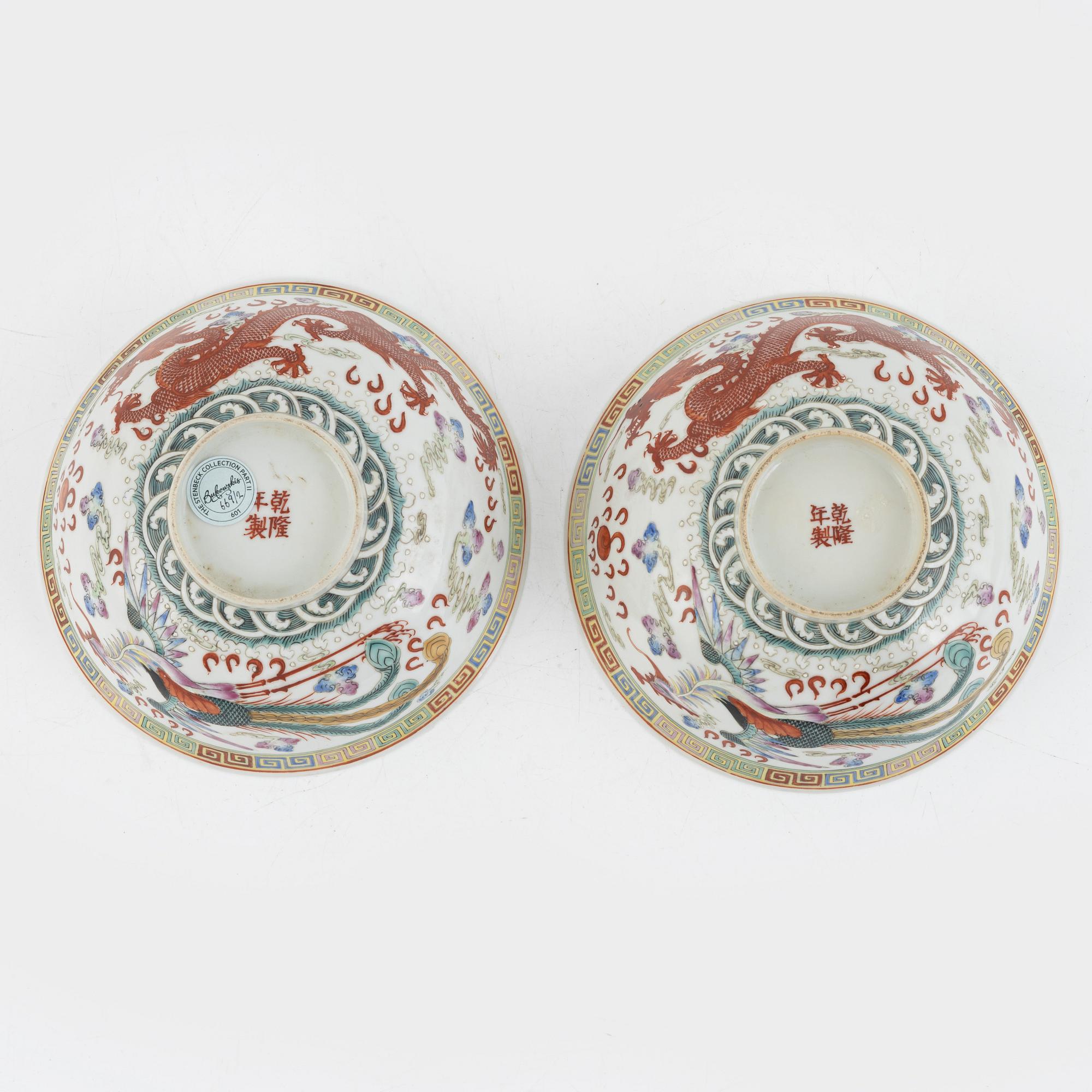 A pair of dragon and phoenix bowls, China, Republic with Qianlong mark.