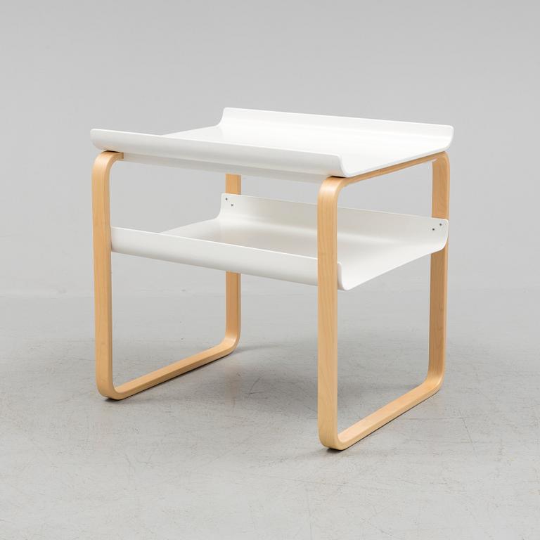 An occational table model 915 by Alvar Aalto for Artek.
