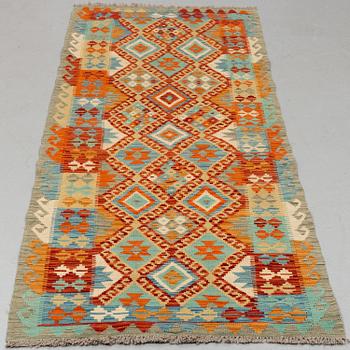 A CARPET, Kilim, ca 242 x 88 cm.