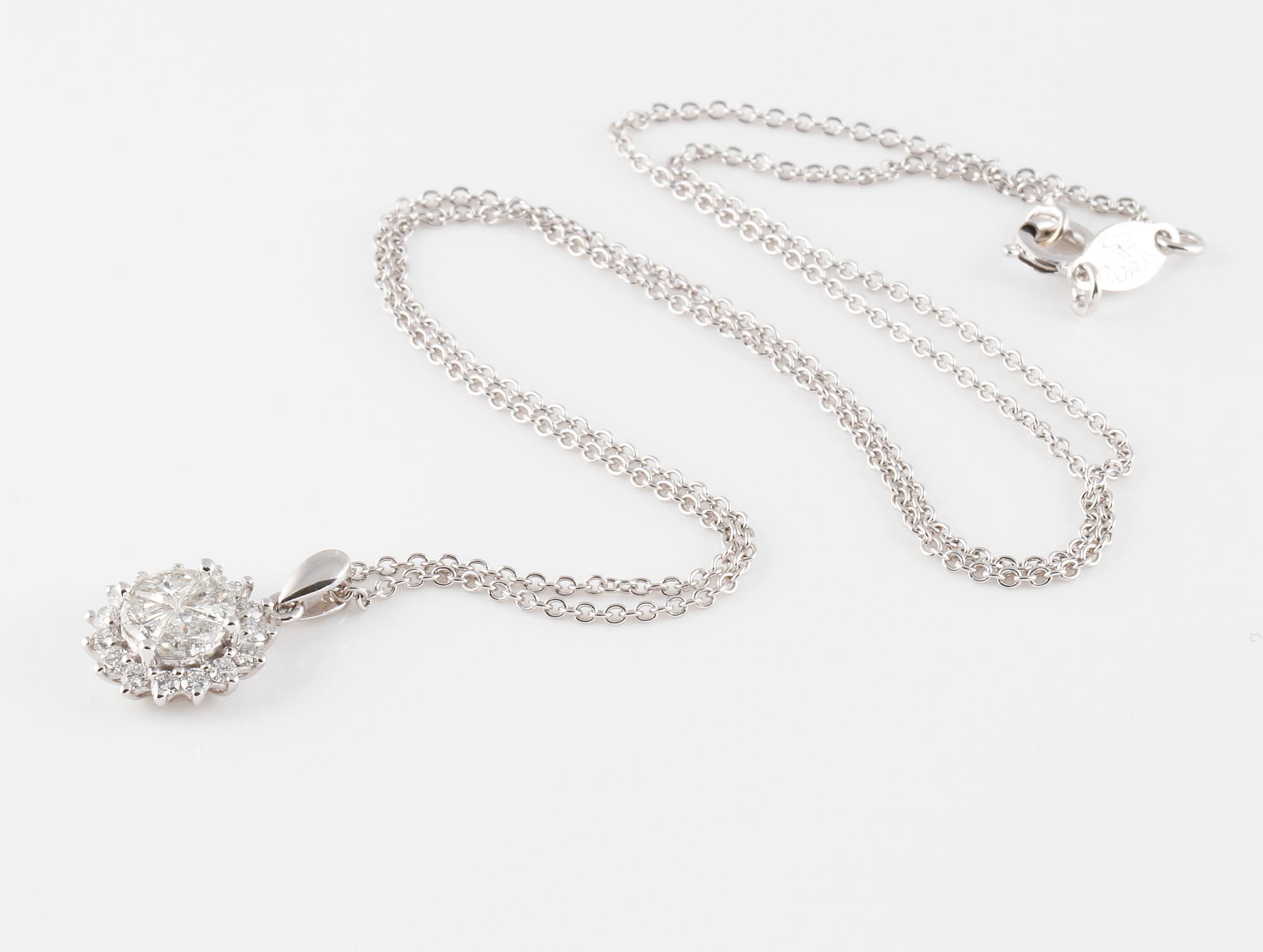 HÄNGE, 18K vitguld med fasett och briljantslipade diamanter ca 0.90 ct. Vikt 3,3 gram.
