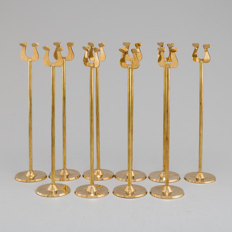 10 CARD STANDS, brass, 20th century.