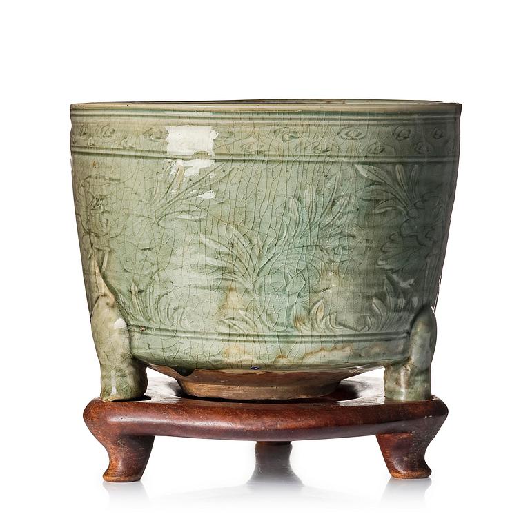 A massive celadon tripod censer, Yuan/Ming dynasty.