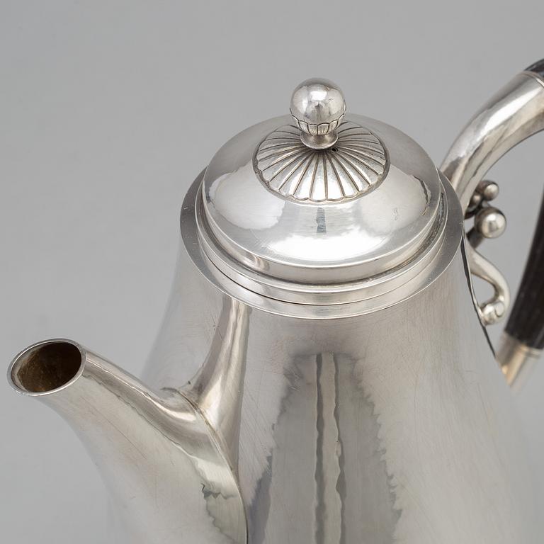 A three piece sterling silver coffee service "Cosmos" design Johan Rohde for Georg Jensen, Copenhage.