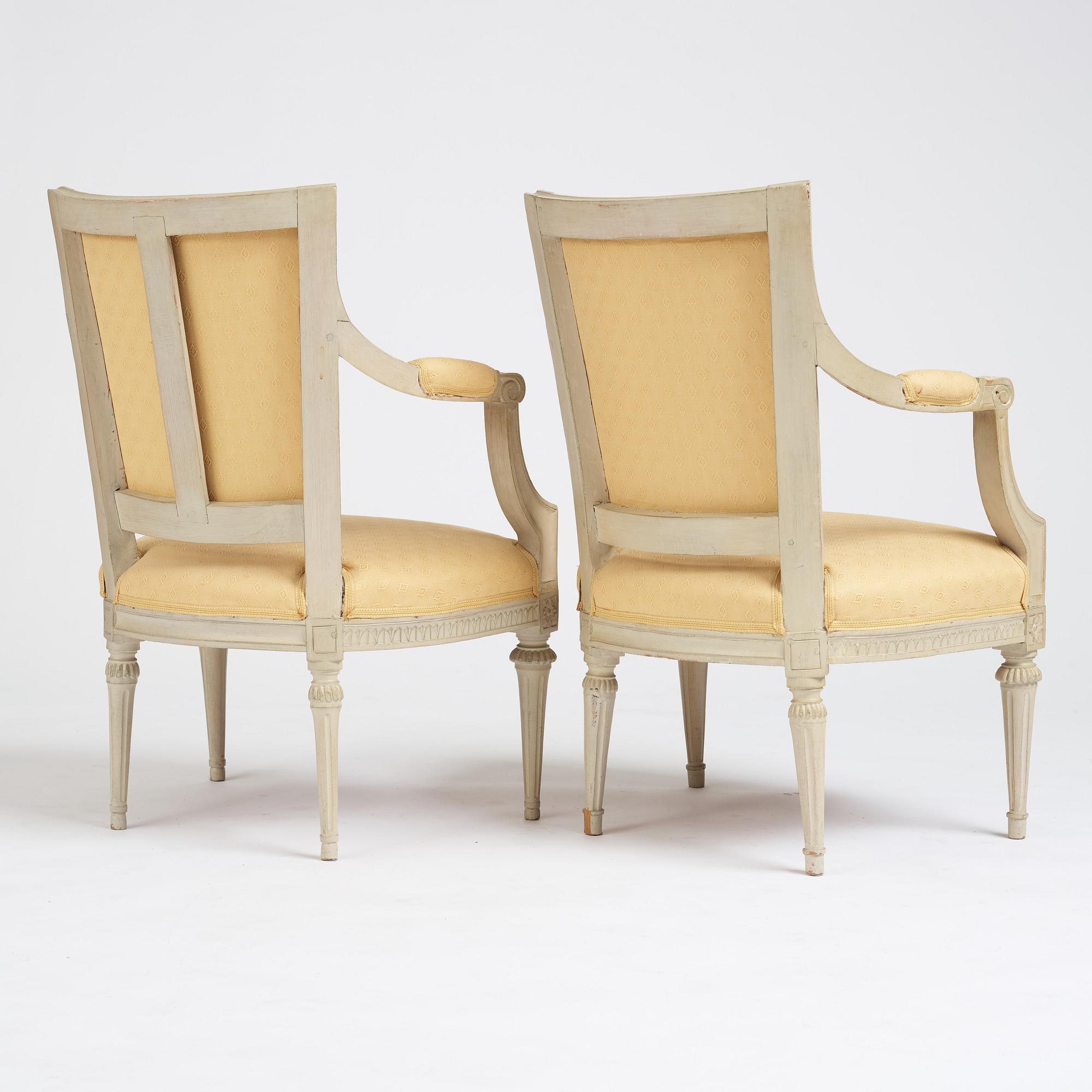 A matched pair of Gustavian armchairs, one signed by Johan Lindgren Stockholm.