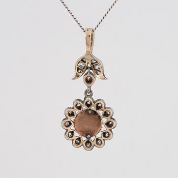 Old-cut diamond and pearl pendant.