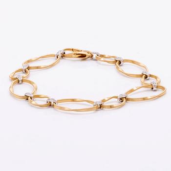 Marco Bicego Italy, bracelet 18k gold and whitegold, brilliant-cut diamonds approx 0,20 ct in total, total weight 9,8 g.