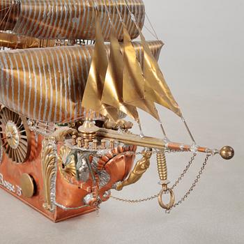 A boat sculpture, dated -75.