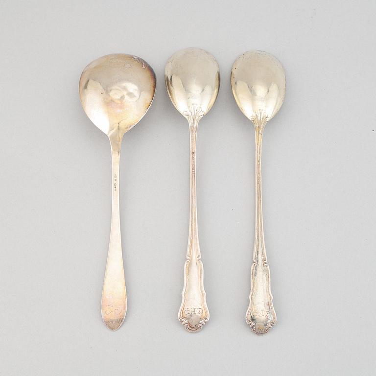 Three silver spoons, by Anders Nilsson, Lund, 1928, and by Anna Östergren, Malmö, 1927.