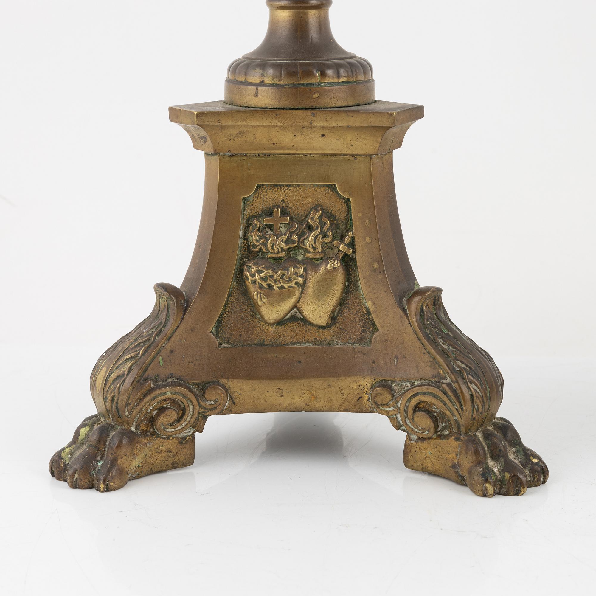 A pair of Baroque style brass altar candleholders, circa 1900.
