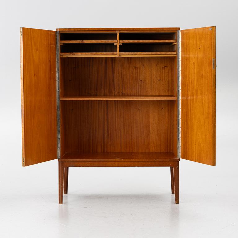 A Swedish Modern cabinet, 1940s.