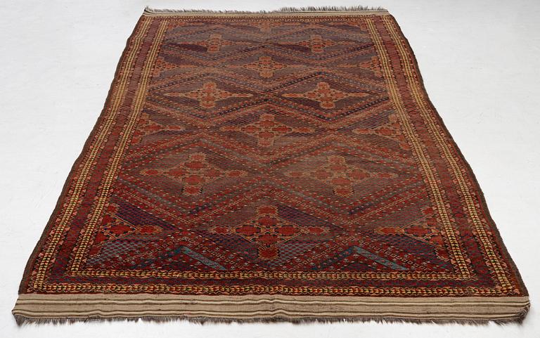 An antique Beshir carpet, ca 495 x 206 cm, around the year 1875.