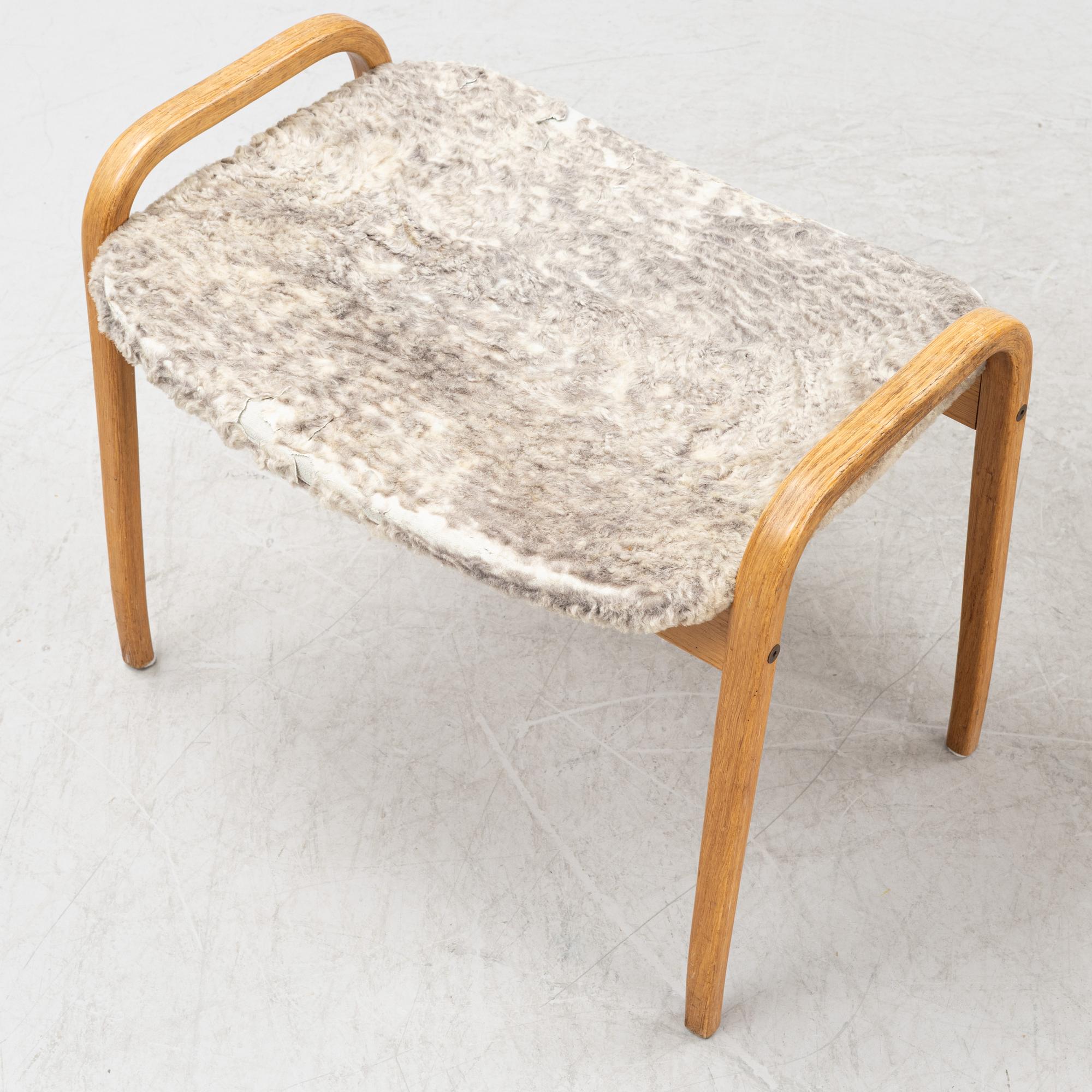 Yngve Ekström, an easy chair with ottoman 'Lamino', Swedese. - Bukowskis