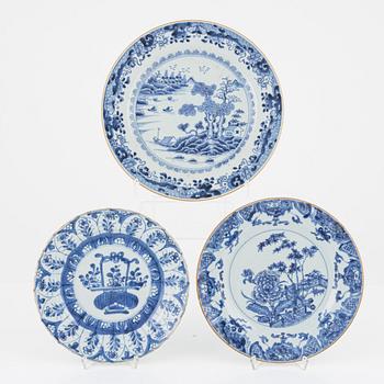 Three blue and white porcelain plates, Kangxi and Qianlong, 18th century.