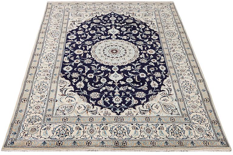 A part silk Nain rug, 9LA, c. 292 x 190 cm.