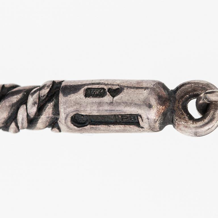 A sterling silver necklace "Twined jewellery from Lampola in Halikko". Kalevala koru, Helsinki 1992.